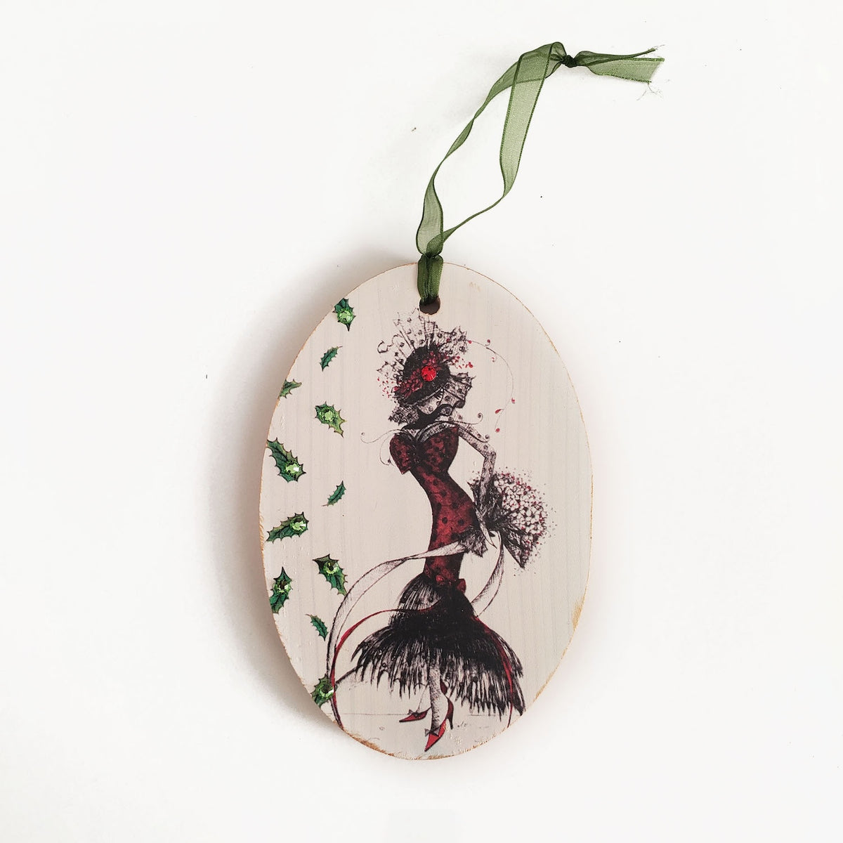 Hand painted wood ornament featuring MeowCleeva® in her dramatic red feather skirt holding a bouquet, adorned with Swarovski crystals. Holly border. One of a kind. $125.