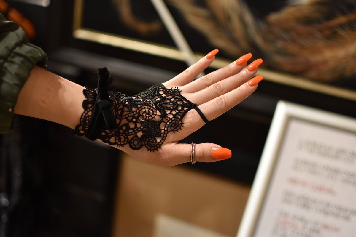 Black lace hand accessory