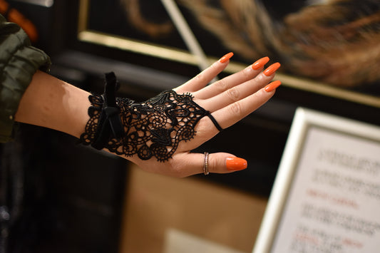 Black lace hand accessory