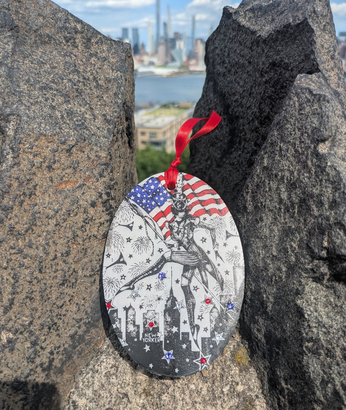 The Showstopper MeowCleeva 250th anniversary patriotic wood ornament NYC Manhattan skyline background red satin ribbon Swarovski crystals handmade