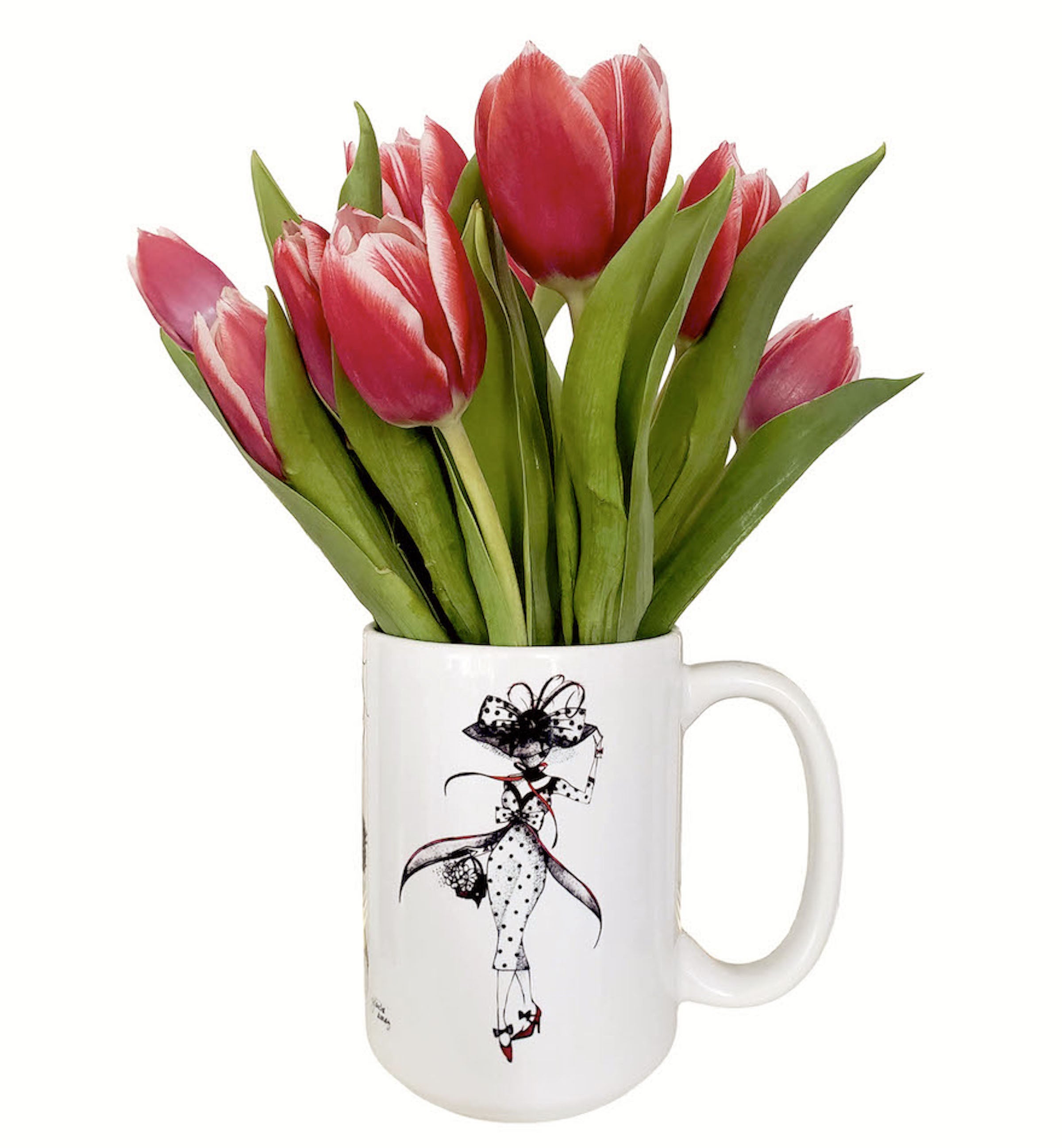 White mug with  fashionable ladies in custom dresses in vintage style. illustration  in black and red by Martha colon. Mug is  filled with  a petite bouquet from whole foods market of pink tulips and green leaves 