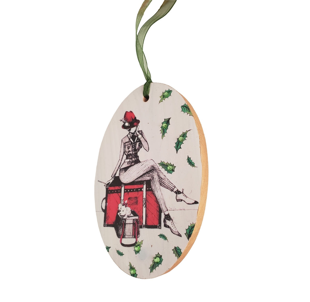 Hand painted wood ornament featuring MeowCleeva® seated on her red trunk with her little dog, adorned with Swarovski crystals. Holly border. One of a kind. $125.