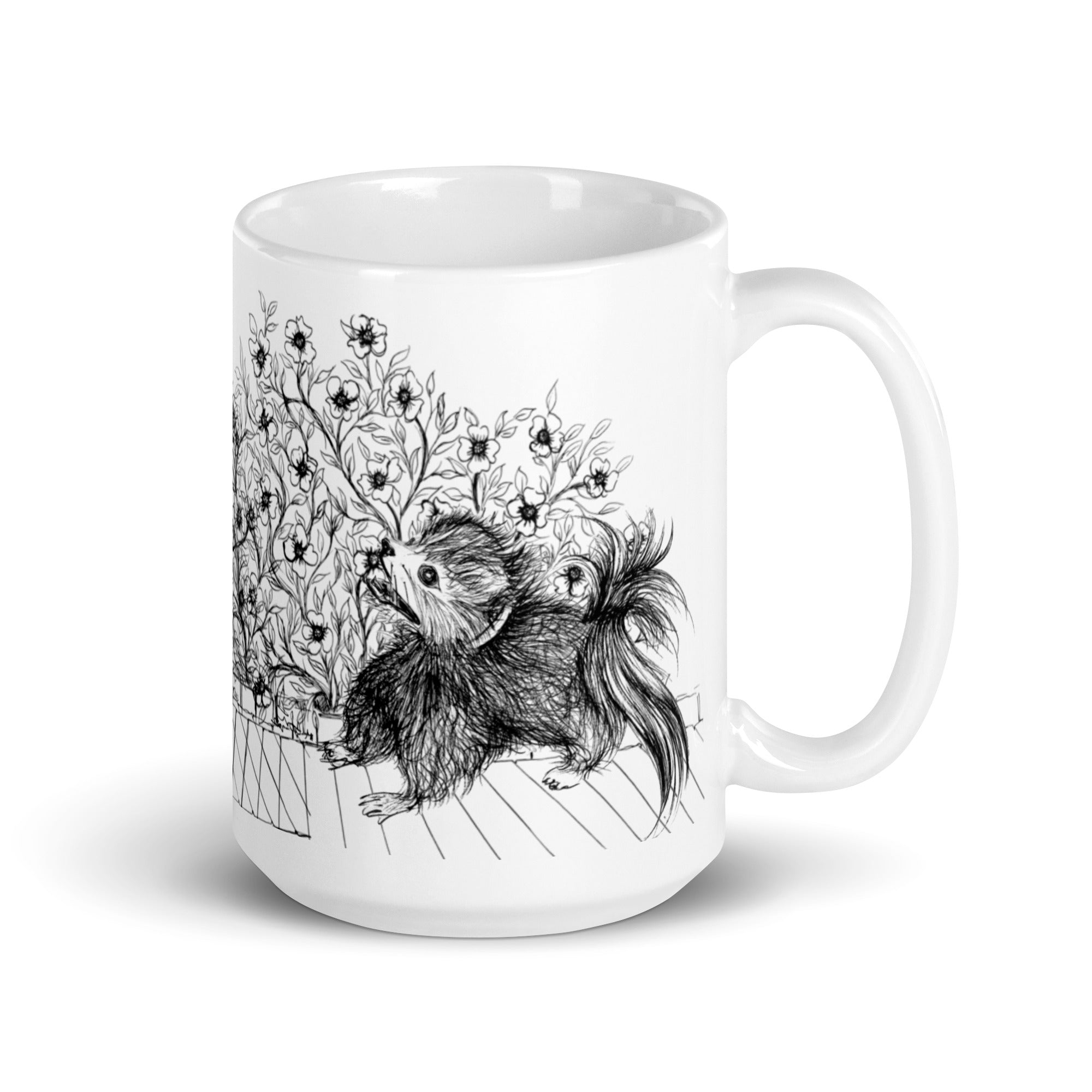 Large white mug with black and white of a pomeranian puppy around a flower garden  illustration by Martha Colón