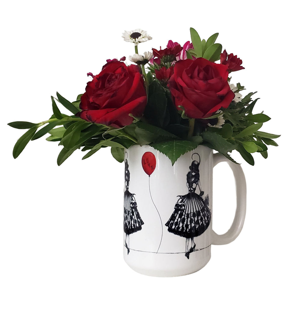 Mug with floral arrangement with a fashion design by Martha Colón