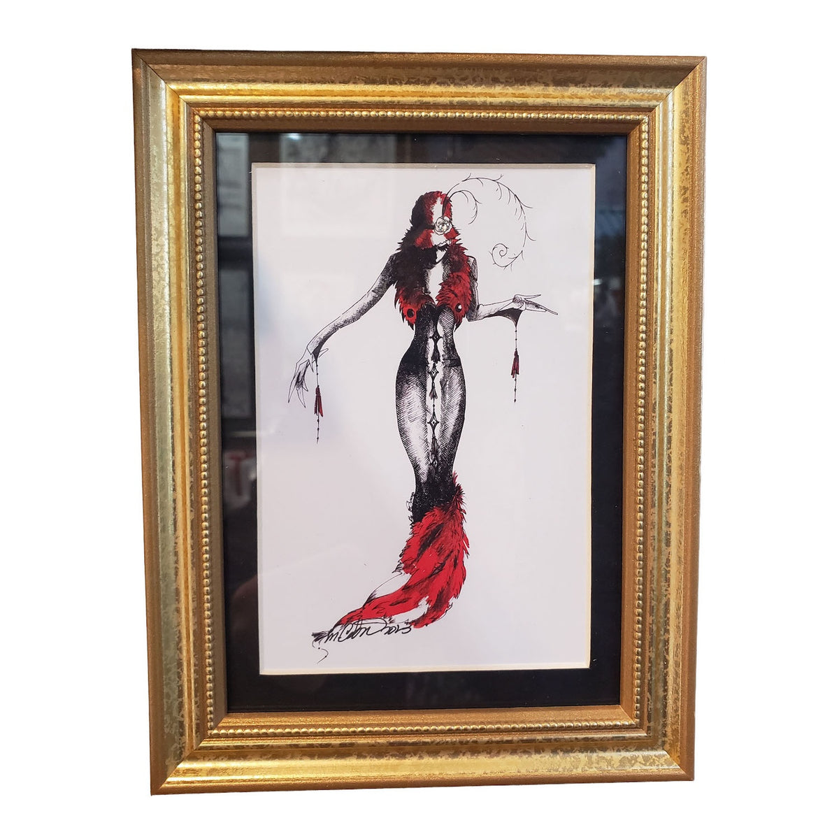 Framed art print featuring a fashion sketch of the character MeowCleeva in a black and white bodysuit with a red feathered collar and red feathered hem, enclosed in a gold frame with a black mat.