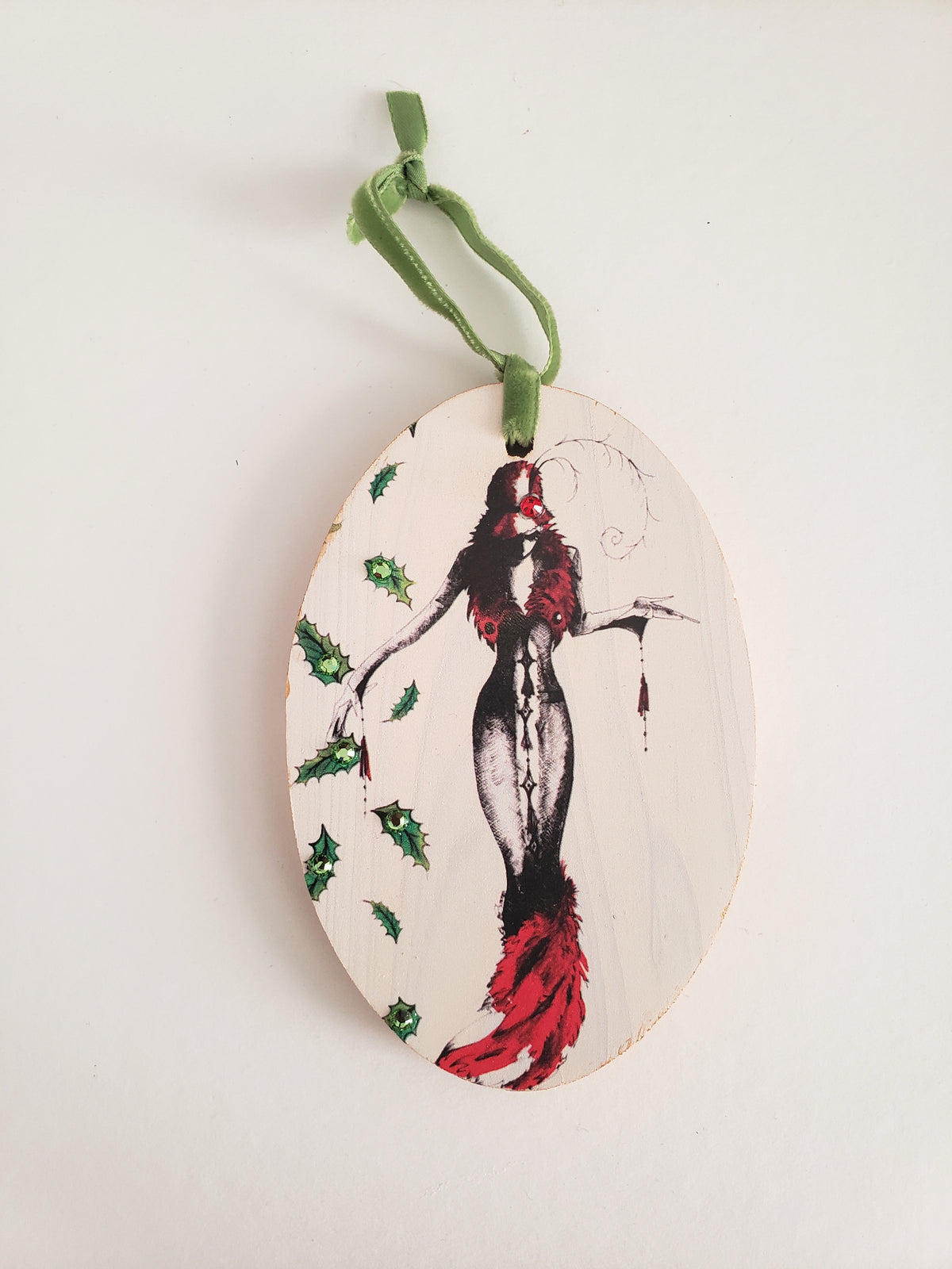 Hand painted wood ornament featuring MeowCleeva® in her dramatic red feather gown, adorned with Swarovski crystals. Holly border. One of a kind. $125.